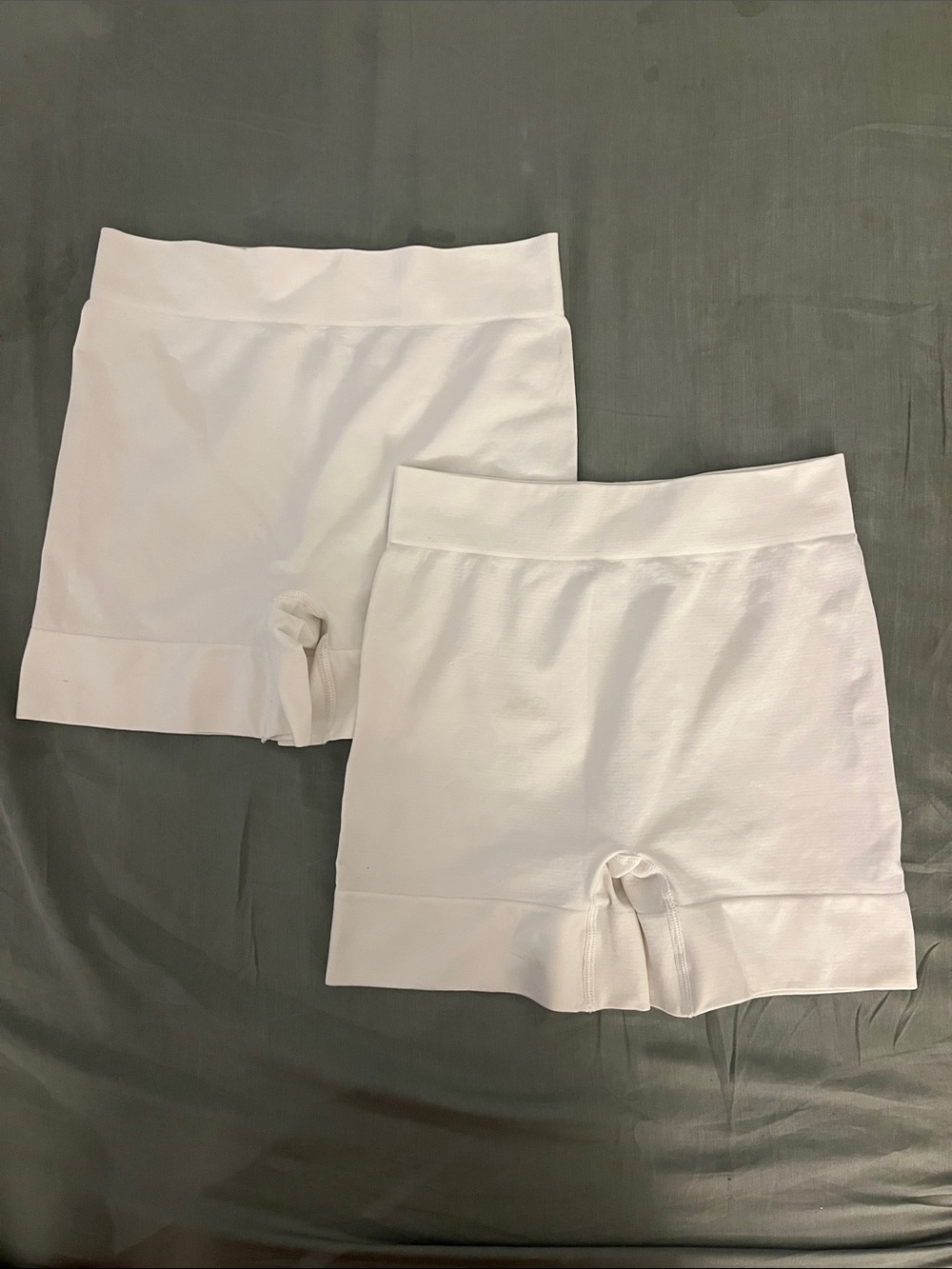 2 pairs of white biker shorts